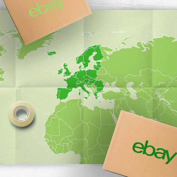 Imagen de un atlas con los países en color verde y sobre él dos cajas con el logotipo de eBay y un rollo de celo