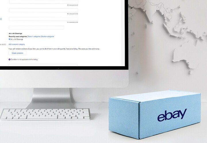 sky blue eBay box next to monitor and keyboard
