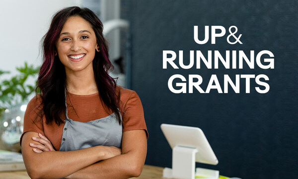 lady with up and running grants as background