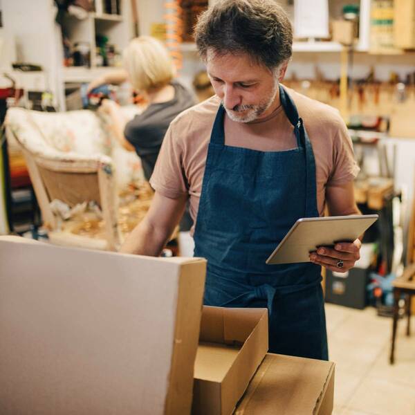 man holding tablet