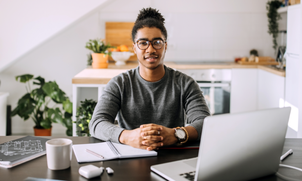 Man in front of a laptop