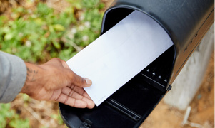 putting mail on mailbox