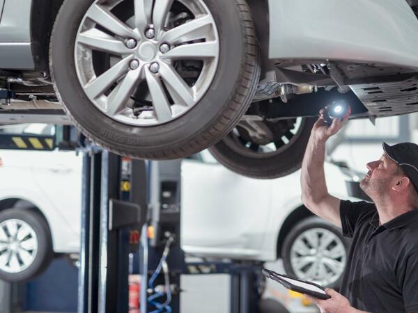 Mechanic working on a car