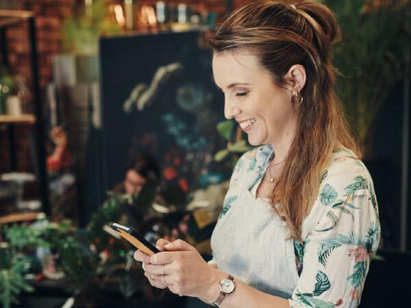 A person viewing their eBay account balance on a phone. 