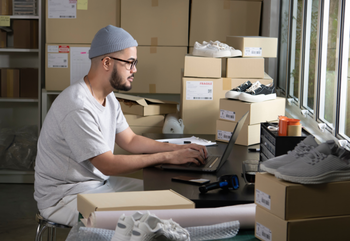 man looking at laptop