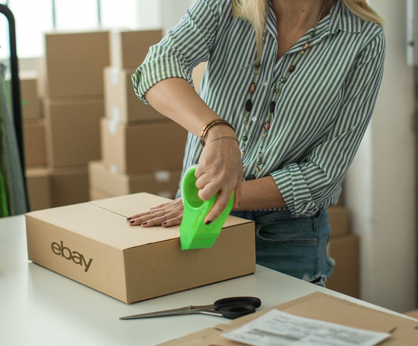 Woman packing an eBay delivery